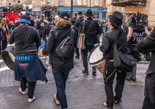 Extinction Rebellion's drummers beating the funereal beat for 'Funeral for Nature' march, Bath '24.