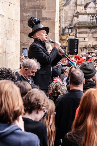 Chris Pakham addressing the crowd outside Bath Abbey at 'Funeral for Nature' march, Bath '24.