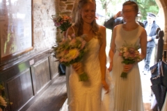 The Bride arrives.