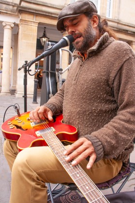 Adam, brilliant busker, Bath, 2025.